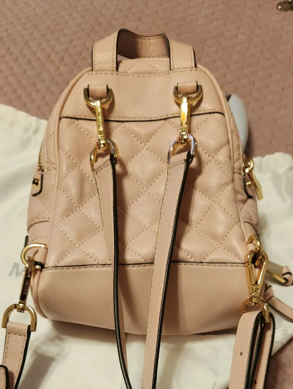 Michael Kors Quilted Convertible Mini Backpack, Crossbody Pale Pink Gold Zipper.